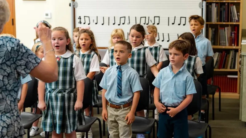 Trinity's Students Singing in Music Class